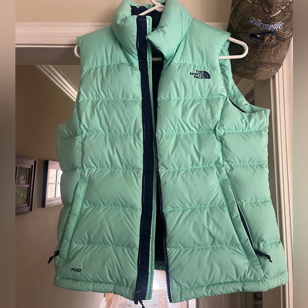 The North Face teal puffer vest